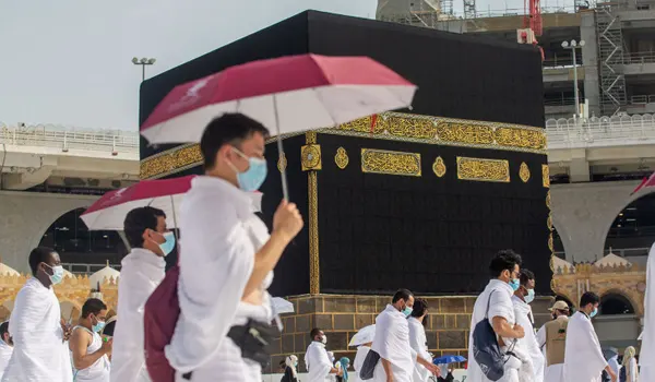 muslim pilgrims at the kaaba uk Ocean Breeze Travels UK